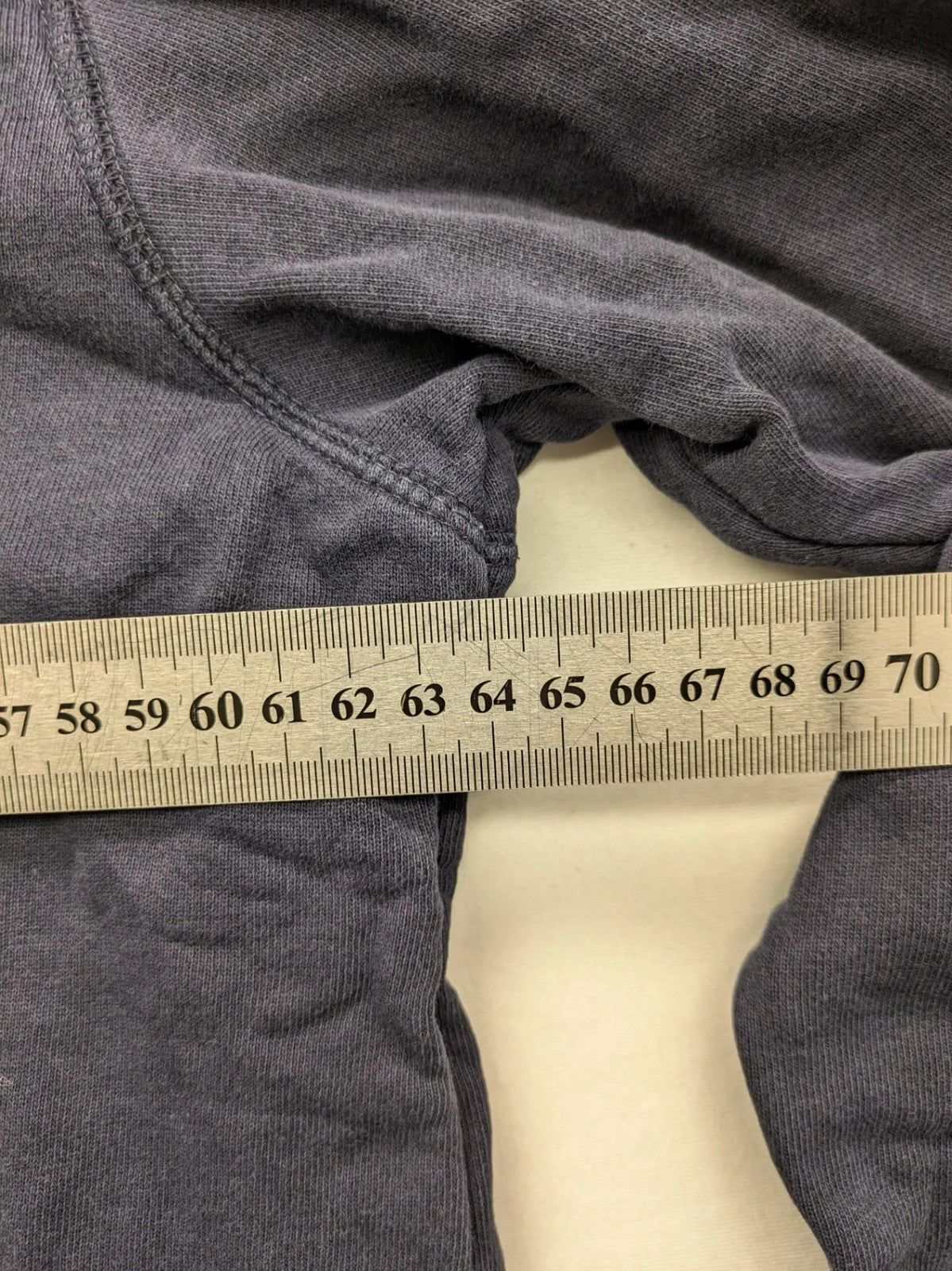 Lerros blue turtle neck jumper with stitched 'British Columbia' detail and button accents.