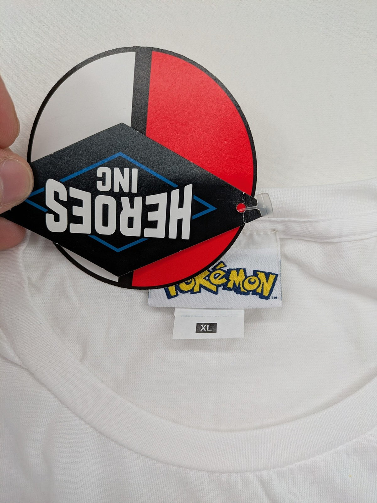 Pokemon graphic t-shirt white comic print featuring Pikachu, Charizard, Blastoise, Venusaur.