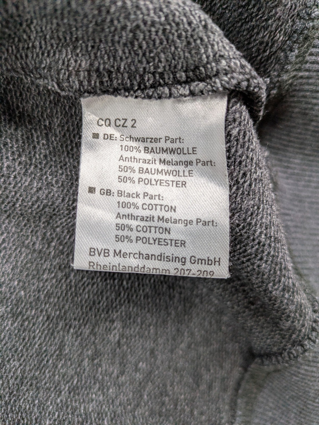 Borussia Dortmund grey and black hoodie with BVB 09 logo and full zip design.