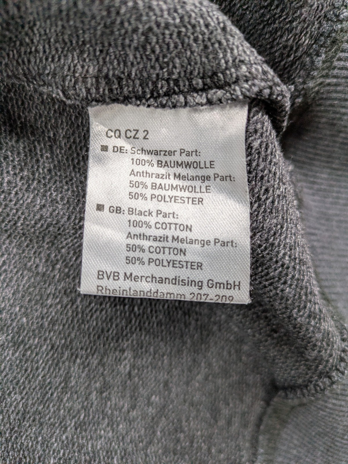 Borussia Dortmund grey and black hoodie with BVB 09 logo and full zip design.