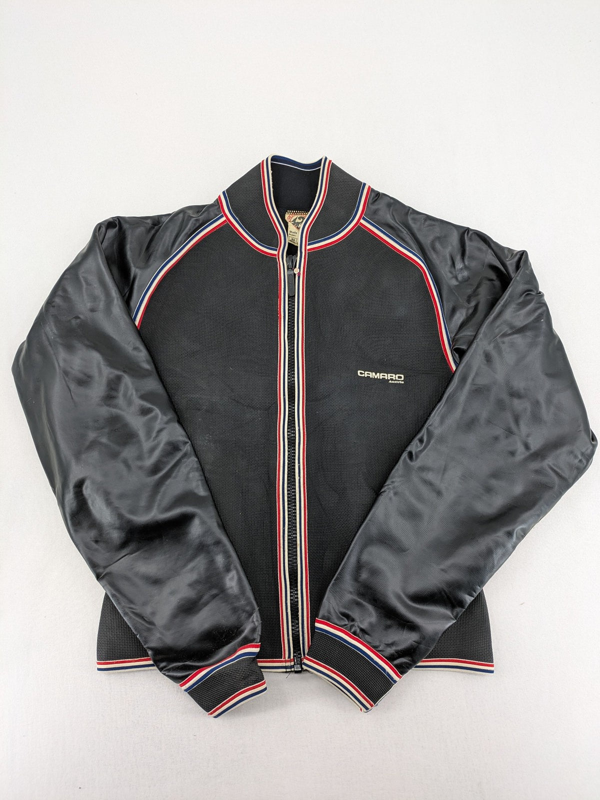 Camaro vintage jacket multi-colour with striped accents and structured body.
