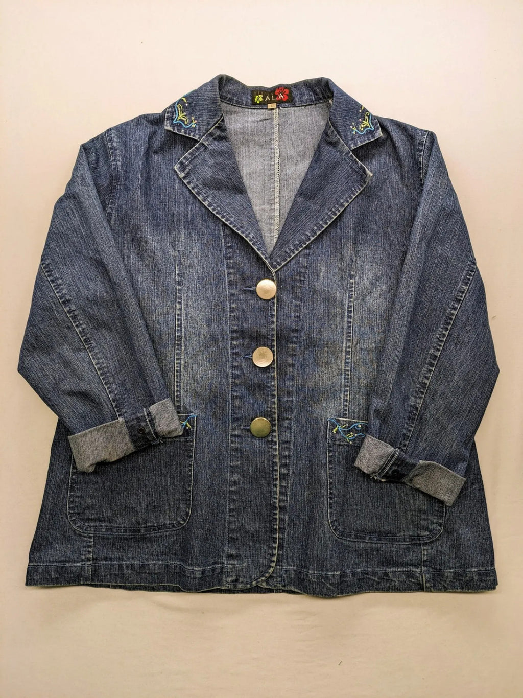 Zala blue denim blazer jacket with embroidered details and classic button closure.
