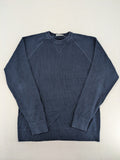 Carhartt navy turtle neck jumper waffle knit texture with subtle logo on sleeve.