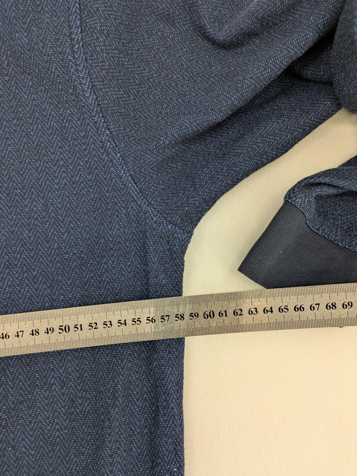 Hajo navy turtle neck jumper with herringbone pattern, zip collar, and chest pocket.