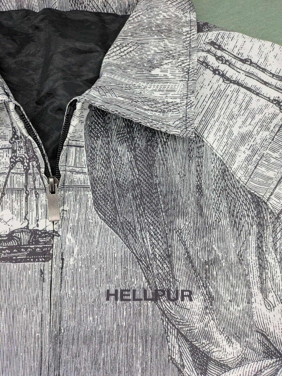 Hellpur black jacket featuring allover print of The Last Supper artwork.