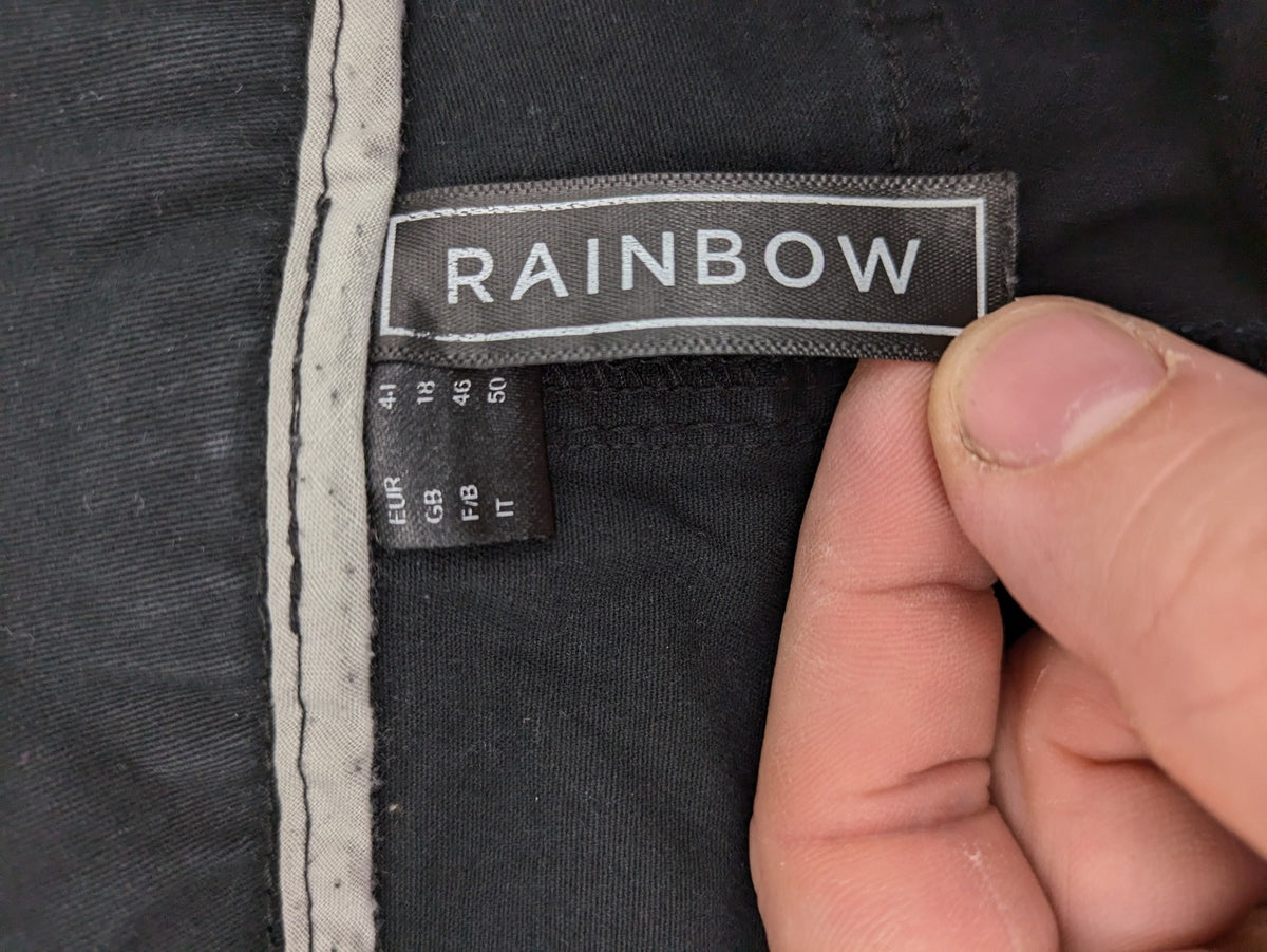 REI grey pants asymmetrical design with diagonal zipper and button placket, cotton blend.