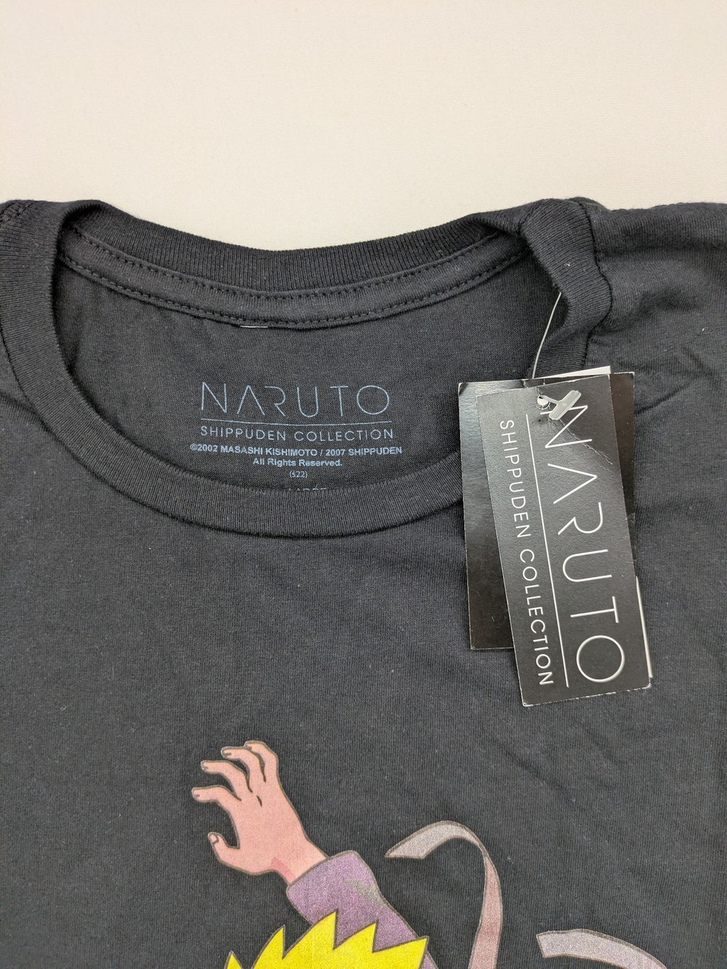 Naruto Shippuden black graphic t-shirt featuring colorful Naruto Uzumaki design, 100% cotton.