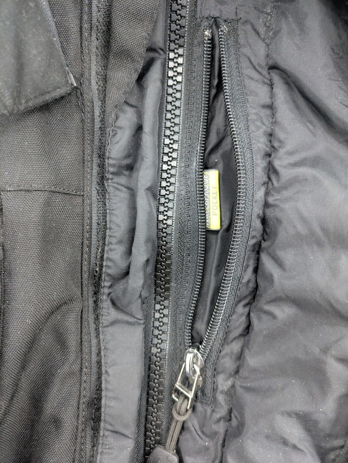 Advanced Experience black motorcycle jacket with Z-Liner membrane and CE protectors, durable Cordura material.