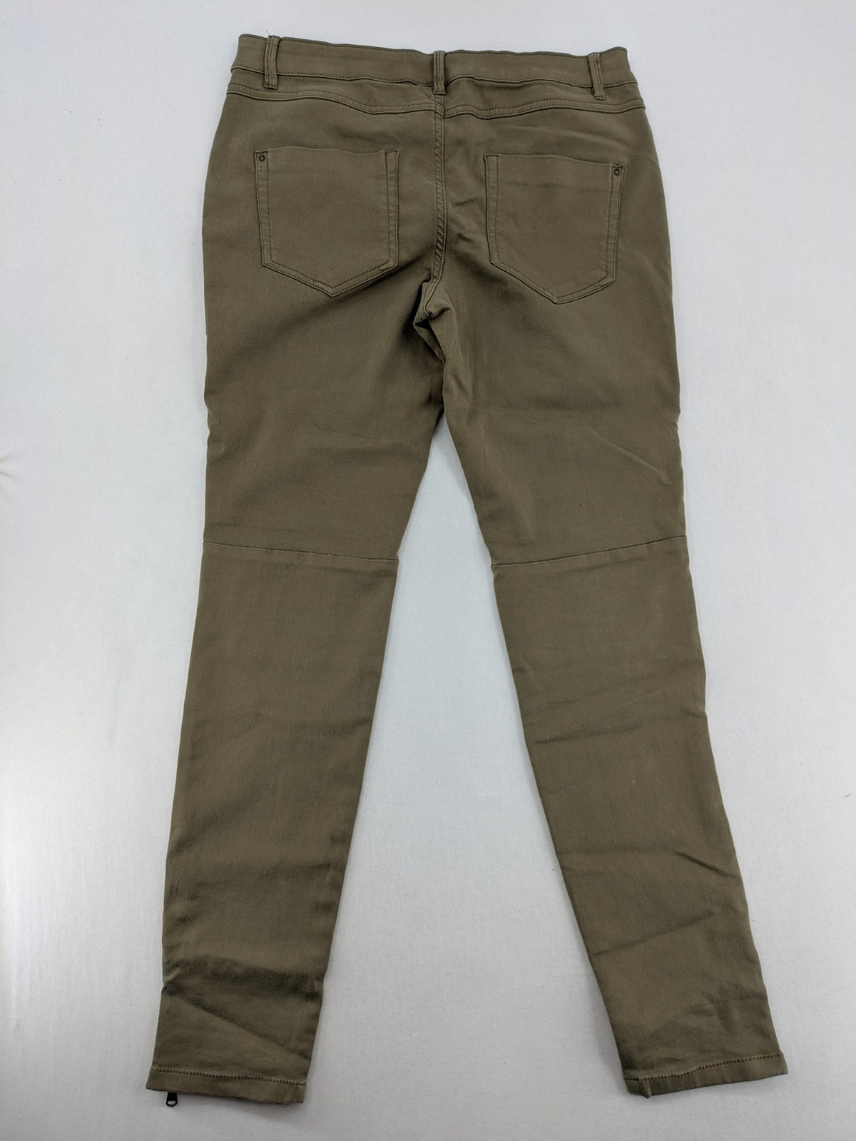 Clockhouse green moto jeggings with ribbed knee panels and ankle zippers.
