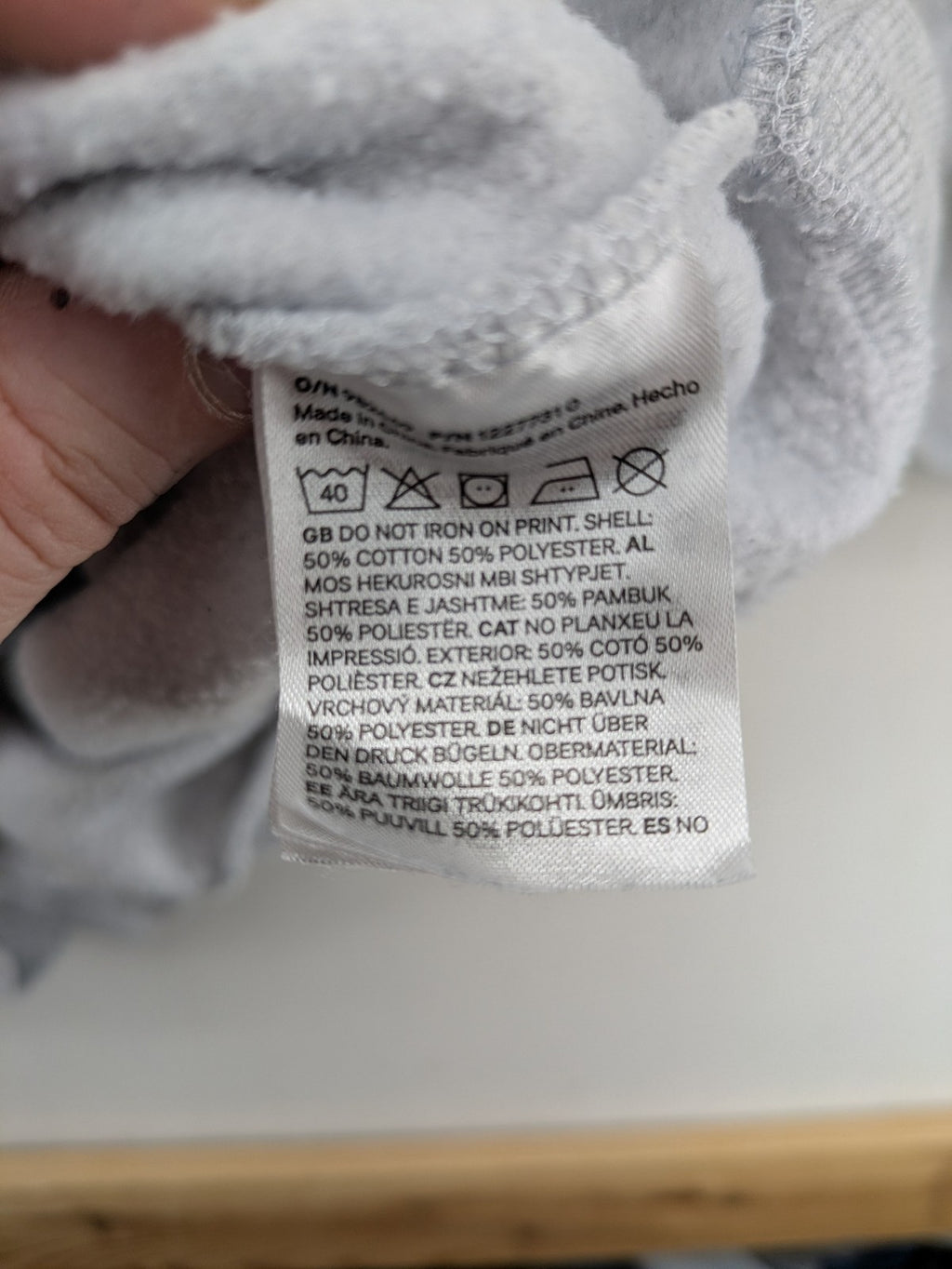 H&M Divided grey turtle neck jumper featuring Nirvana "In Utero" angel graphic.