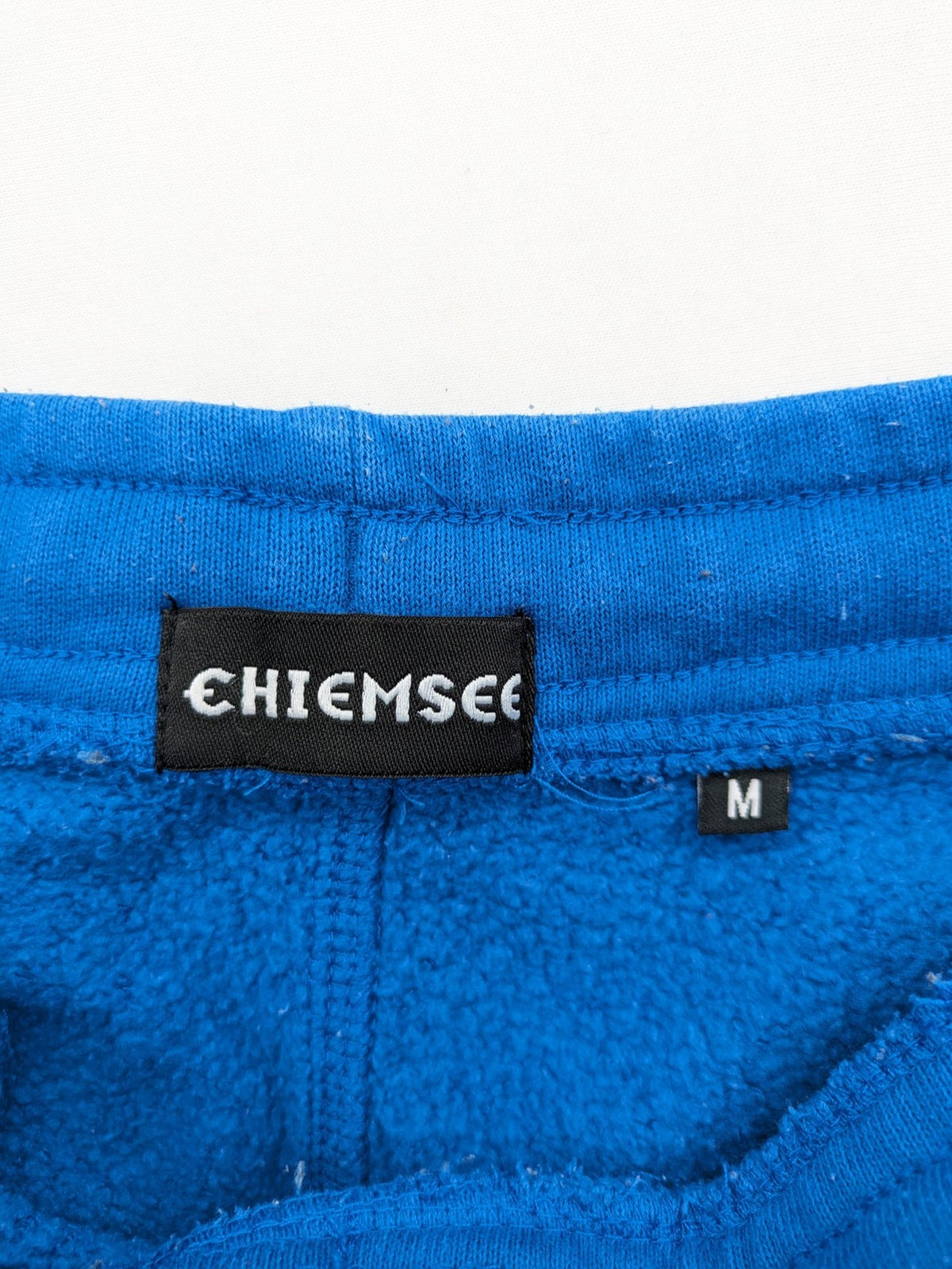 Chiemsee blue sweatshorts with logo print, elastic waistband, and side pockets.