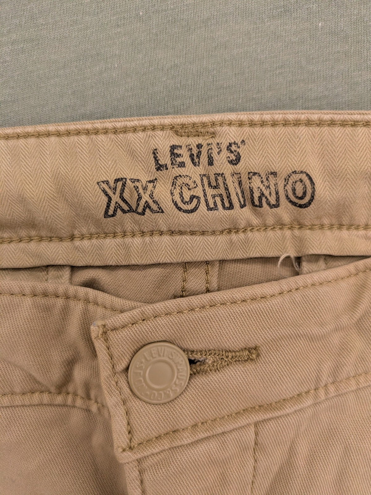 Levi's beige XX Chino pants slim taper fit with classic logo and quality fabric.