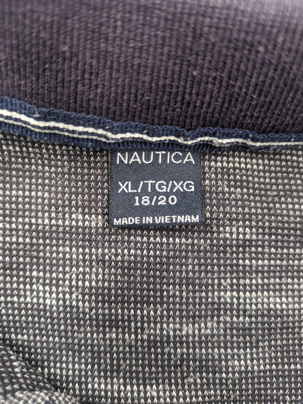 Nautica grey melange polo shirt with contrasting collar and embroidered sail logo.