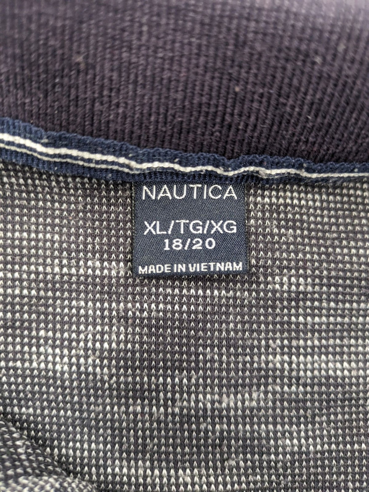 Nautica grey melange polo shirt with contrasting collar and embroidered sail logo.