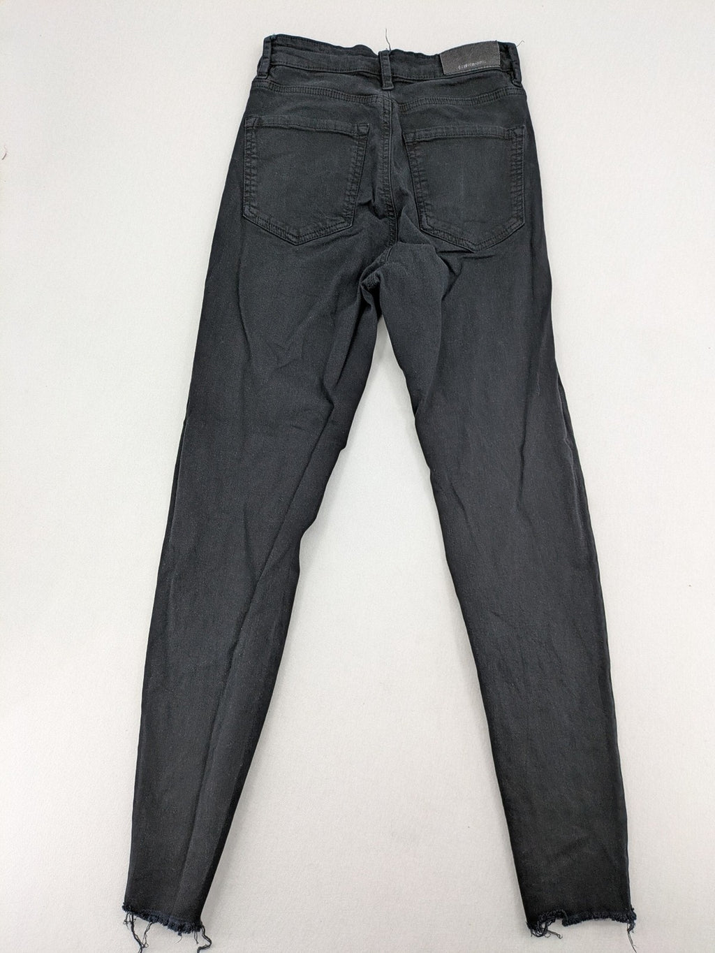 Stradivarius black skinny jeans high waist raw hem five-pocket style