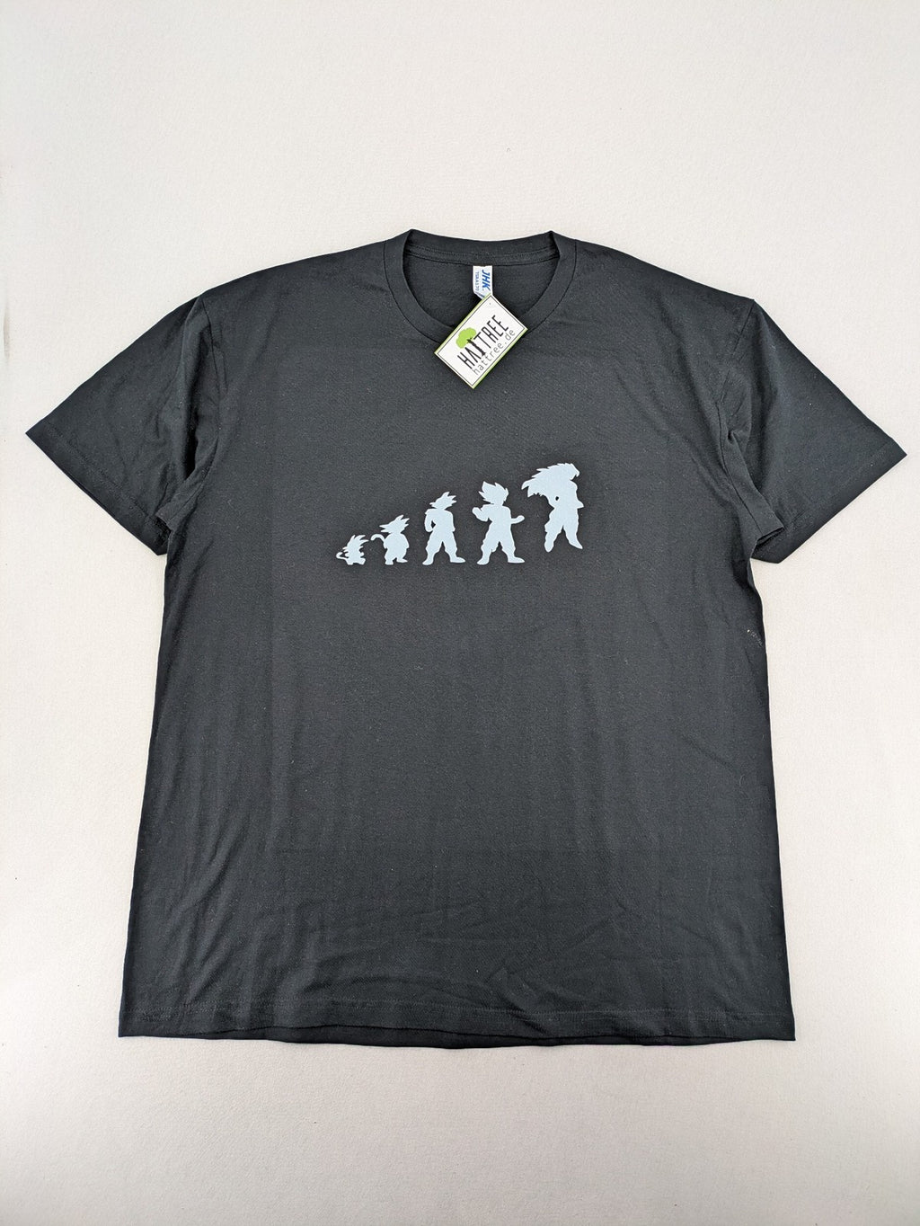 Dragon Ball Z blue and grey t-shirt featuring Son Goku evolution graphic, 100% cotton.