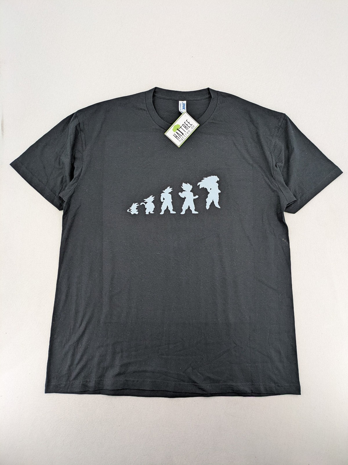 Dragon Ball Z blue and grey t-shirt featuring Son Goku evolution graphic, 100% cotton.