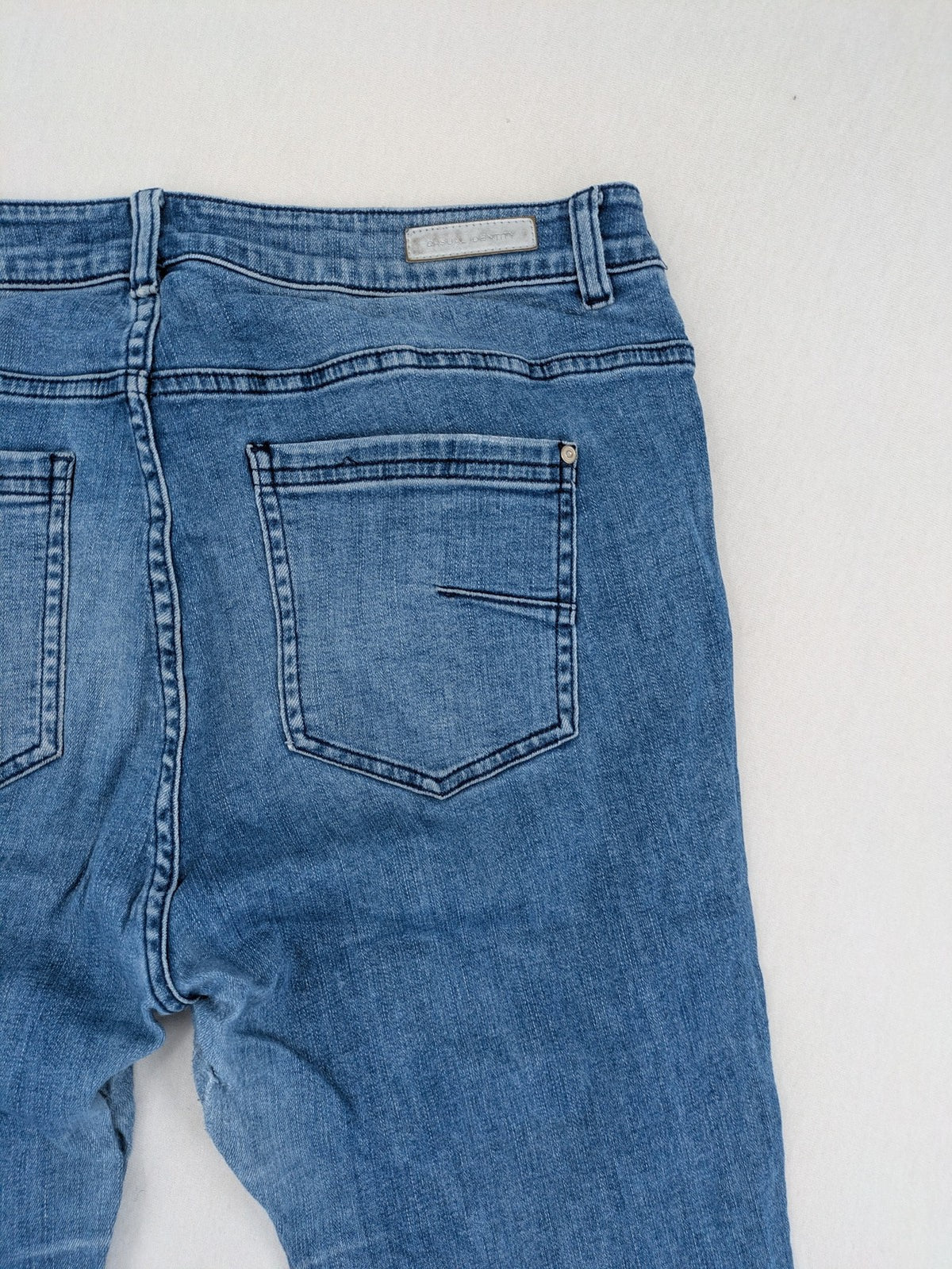 Comma blue skinny fit jeans with classic 5-pocket design and stretch denim material.