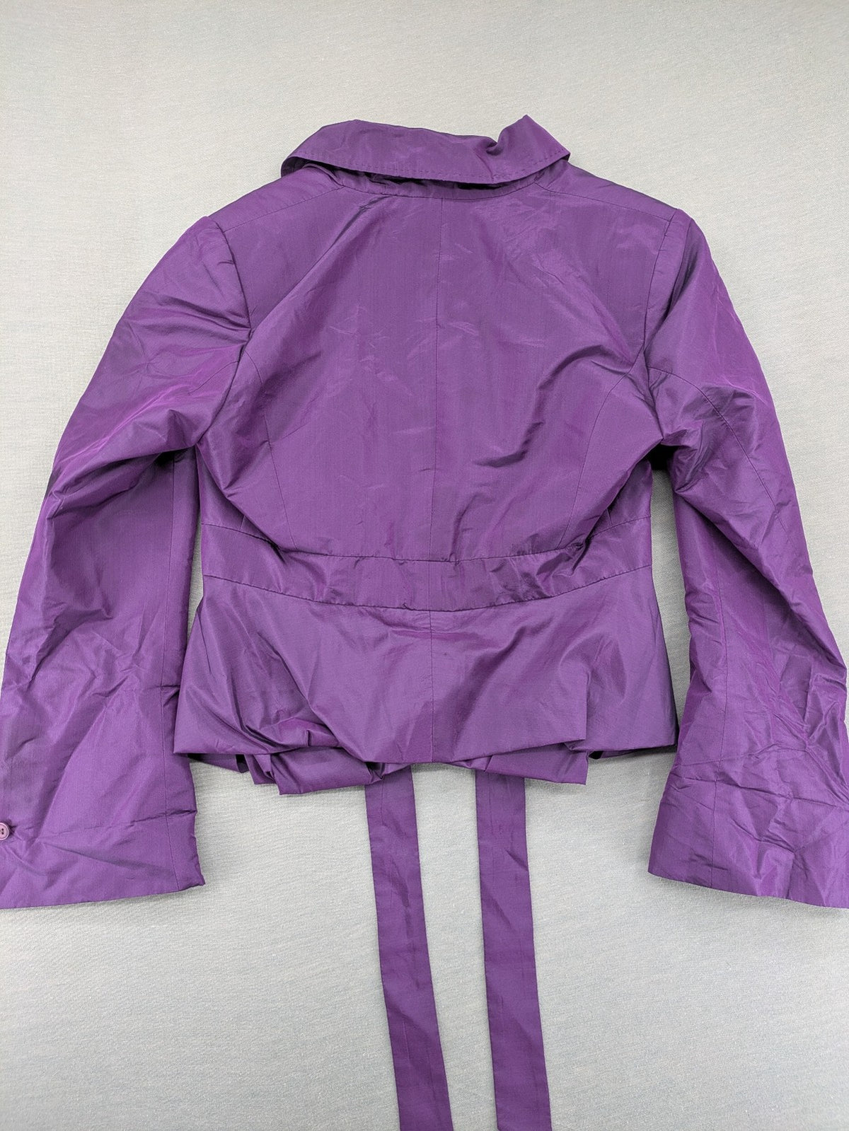 Claudia Sträter purple silk blazer with shawl collar and belt detail.