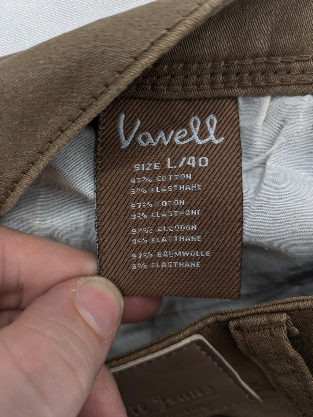 Vavell khaki skinny jeans five-pocket design with unique front zipper detail.