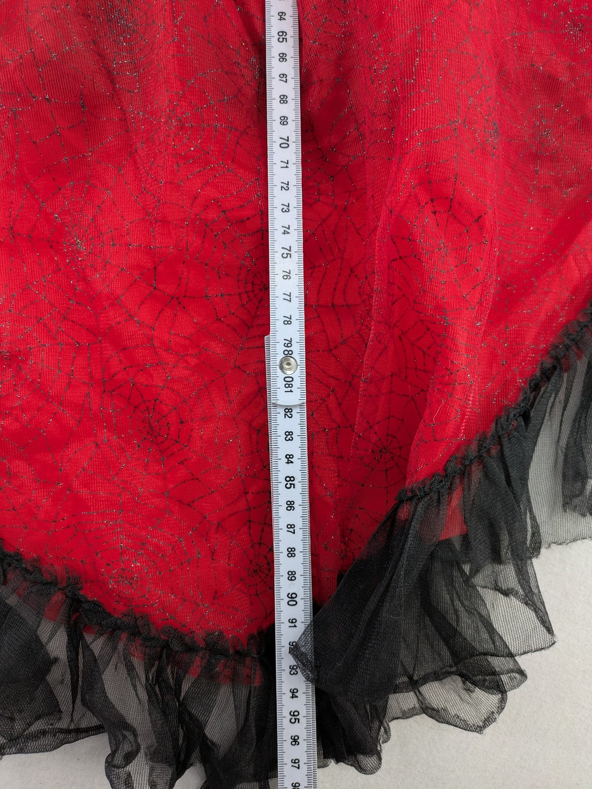 Perfekt red and black costume dress with corset lacing and spiderweb sleeves.