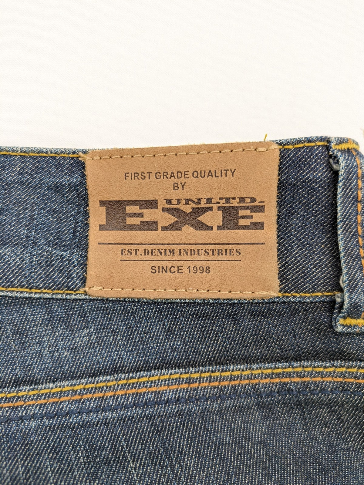 Exe blue straight jeans slim fit bootcut stretch denim with classic 5-pocket styling.