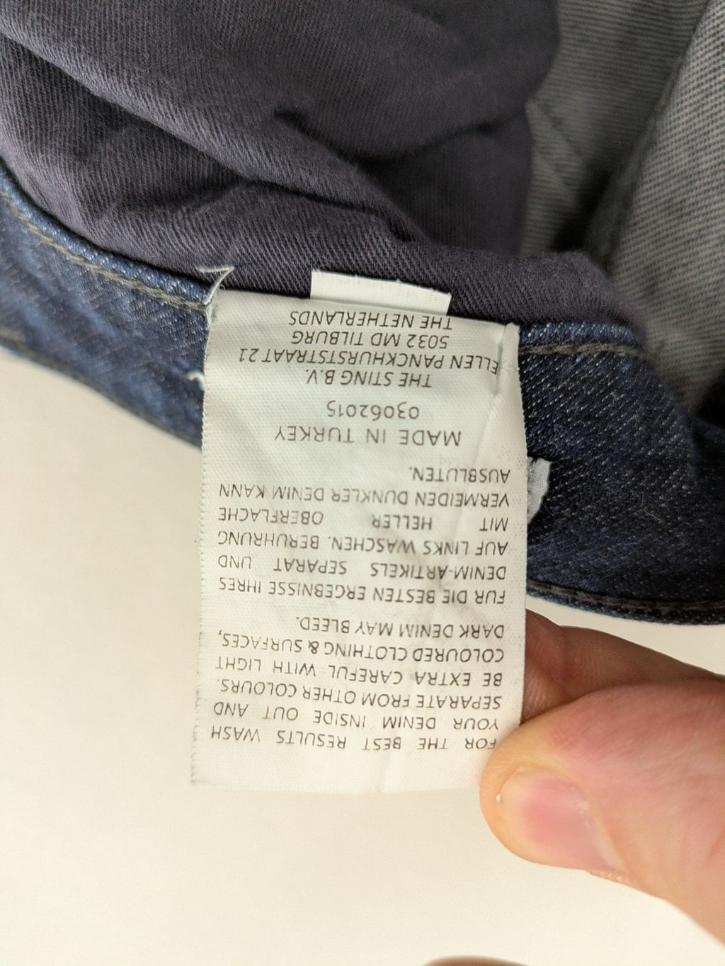 DISTRIKT NØRREBRO blue slim fit jeans with classic rinse wash and stretch denim material.