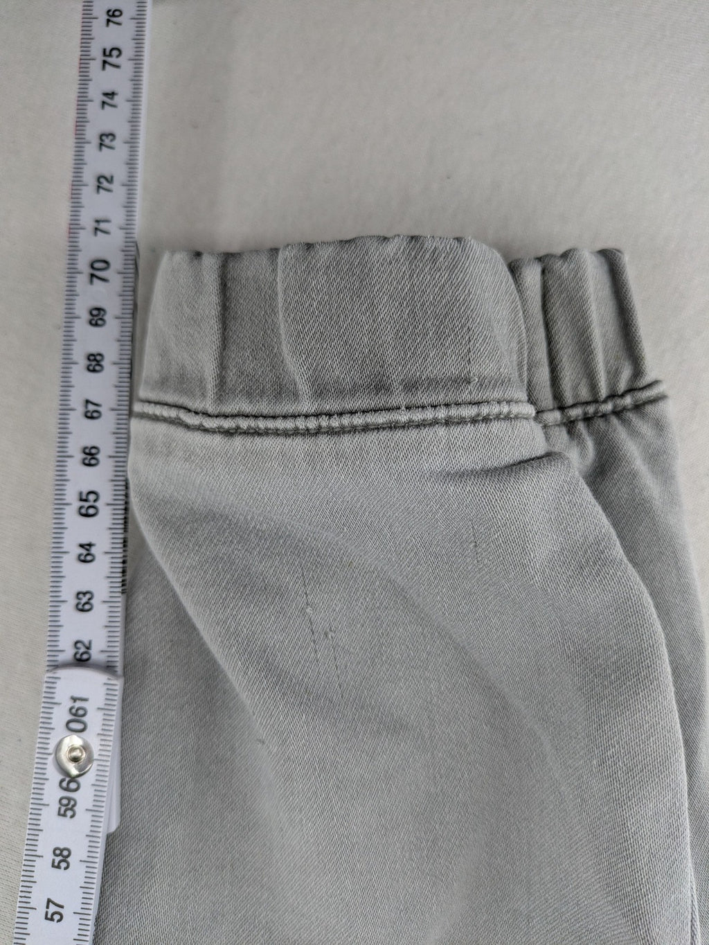 Denim & Co. grey jogger jeans with elastic waistband and ankle cuffs, cotton material.