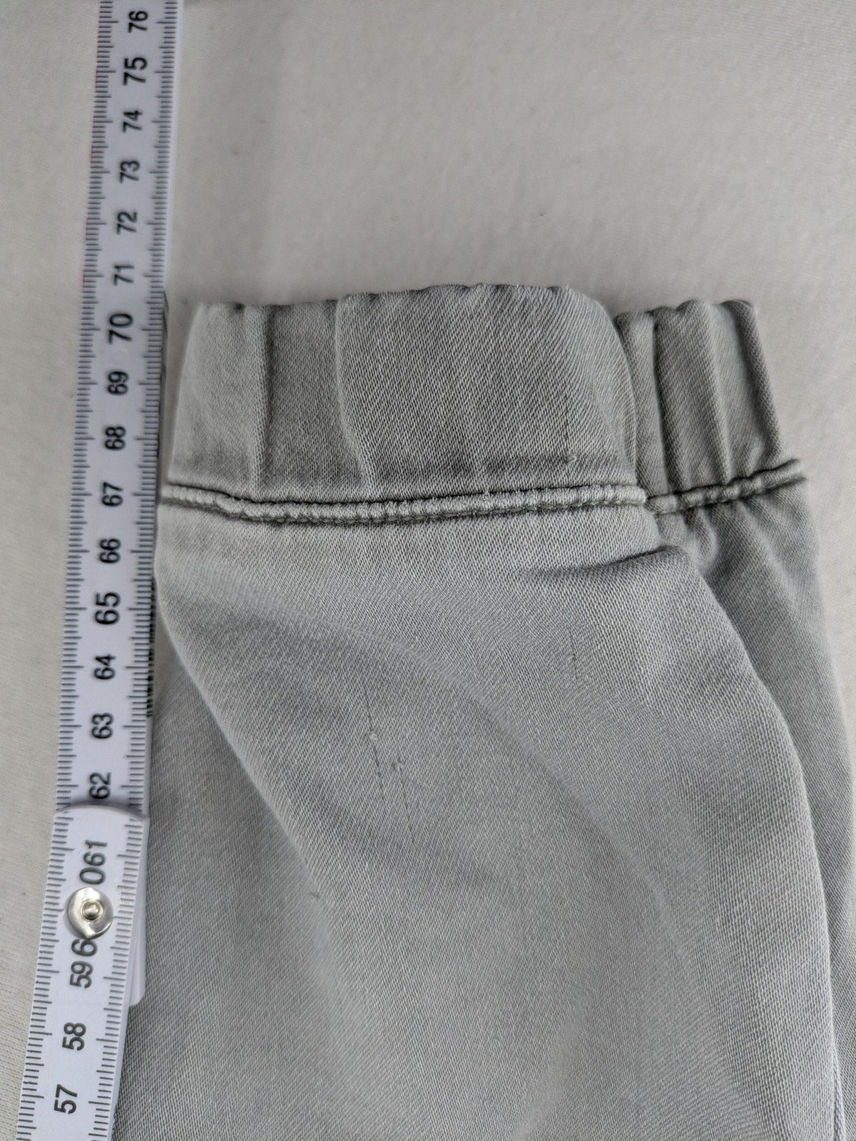 Denim & Co. grey jogger jeans with elastic waistband and ankle cuffs, cotton material.