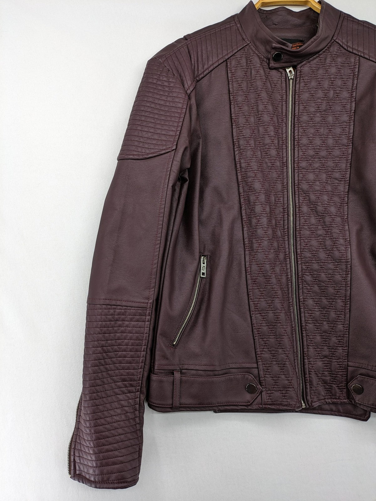 Leif Nelson burgundy biker jacket faux leather with quilted shoulder and sleeve details.