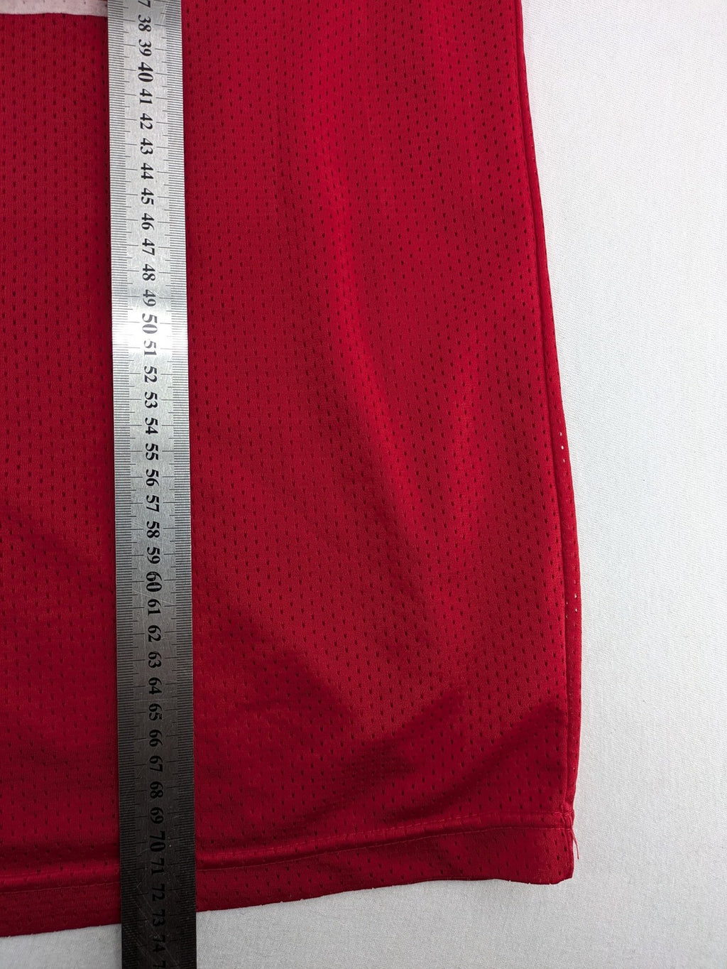 Spalding vintage red basketball jersey size XL, number 11, with black and white striped trim.