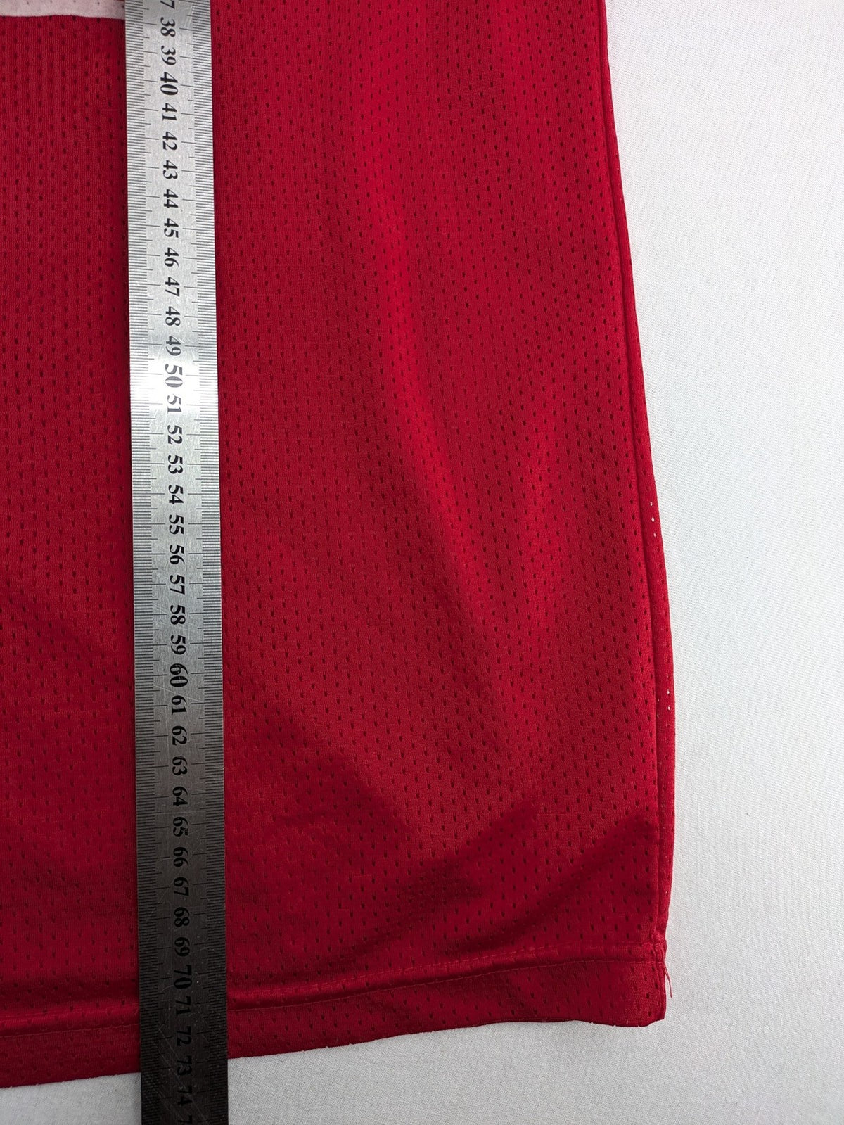 Spalding vintage red basketball jersey size XL, number 11, with black and white striped trim.