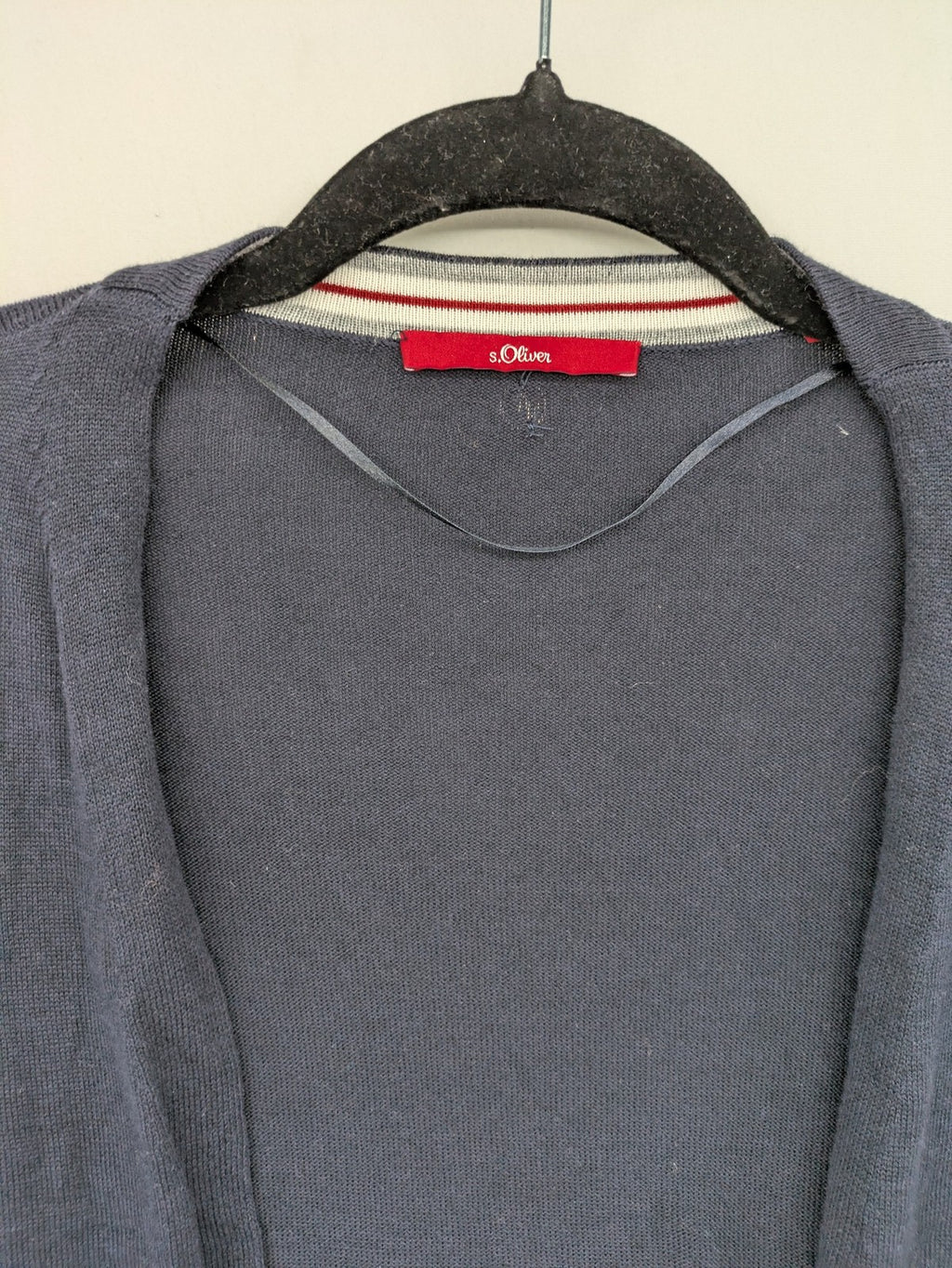 s.Oliver green turtle neck jumper soft viscose blend with ribbed cuffs and subtle logo.