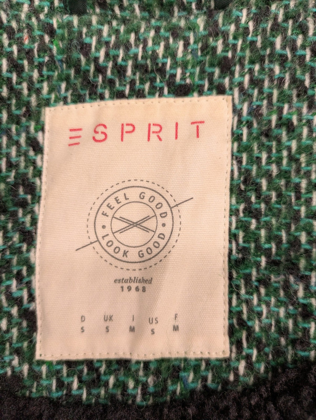 Esprit green black white tweed coat with notch collar and three-button closure.