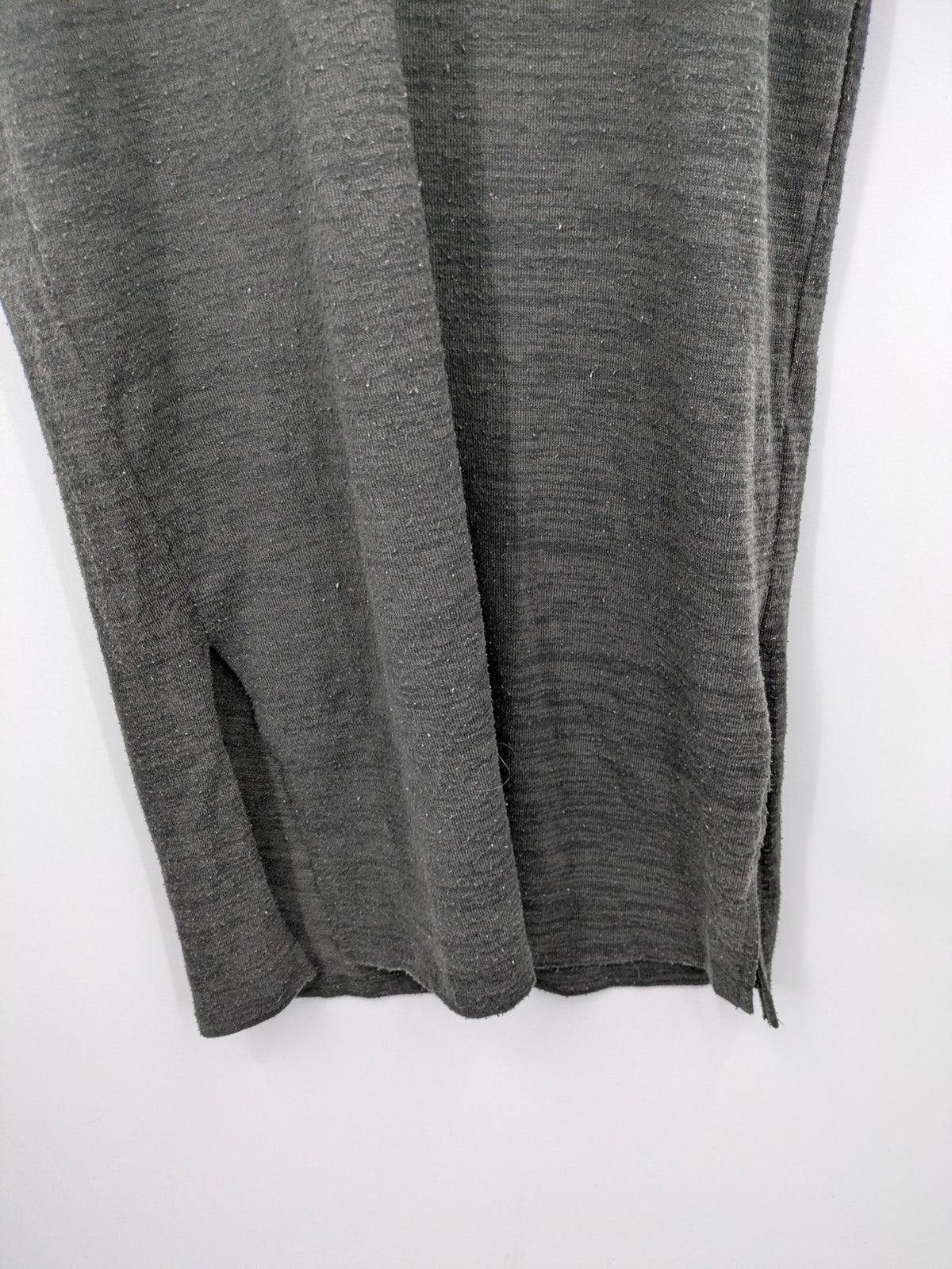 Vero Moda grey midi dress with long sleeves, standing collar, and side slits.