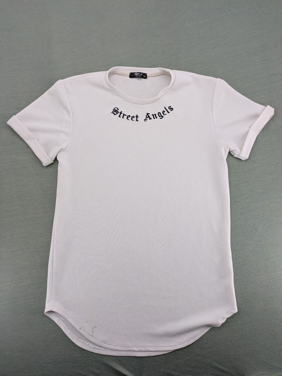 MIZ-U white longline t-shirt with "Street Angels" embroidery and rolled sleeves.
