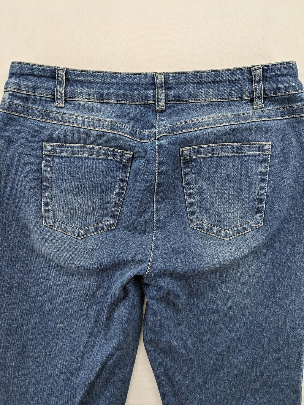 Gerry Weber blue straight jeans with decorative rhinestone appliqués and stretch denim material.