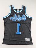 Friends With Money blue basketball jersey black mesh with stylized graphic and number "1
