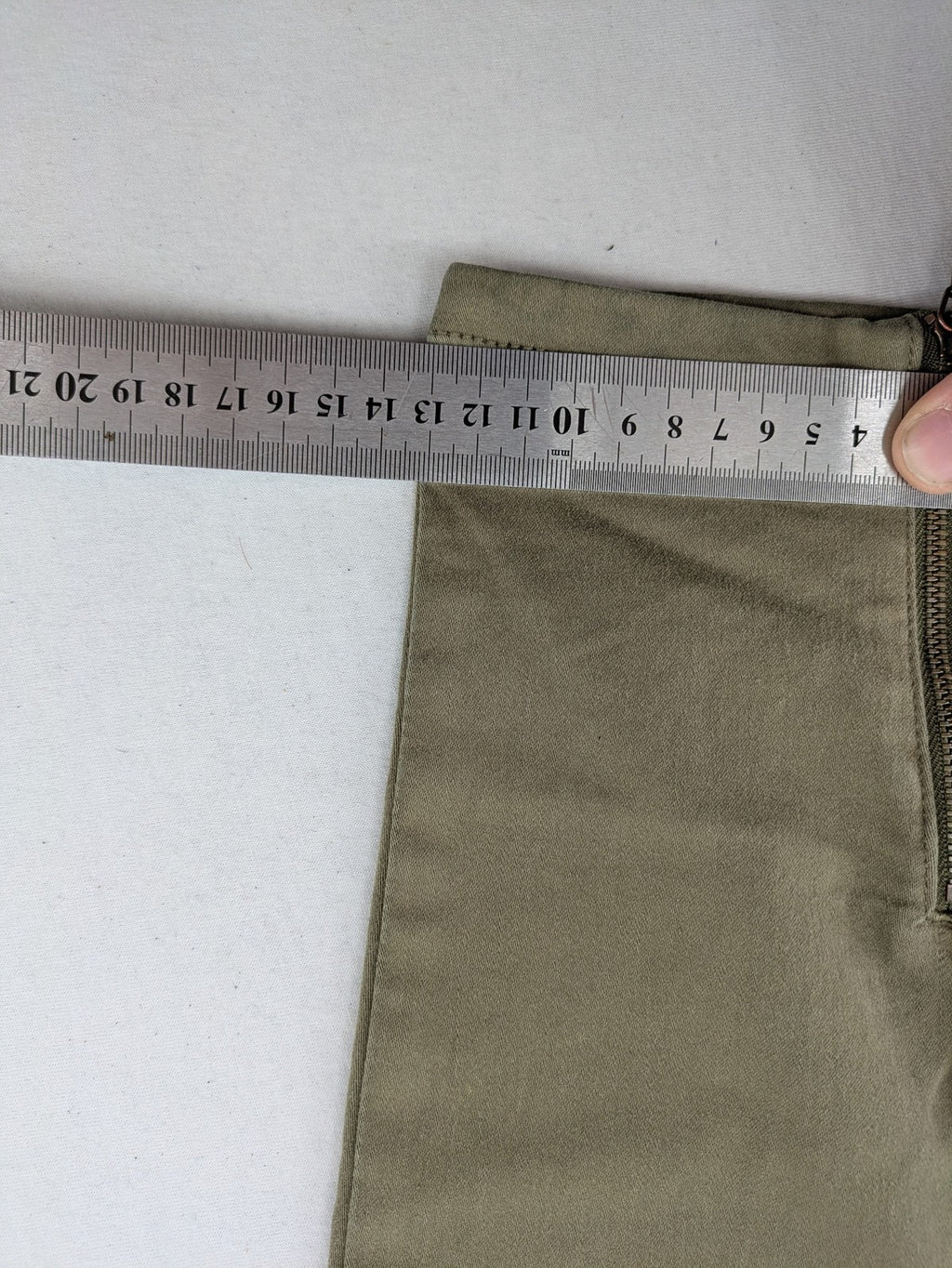 Clockhouse green moto jeggings with ribbed knee panels and ankle zippers.