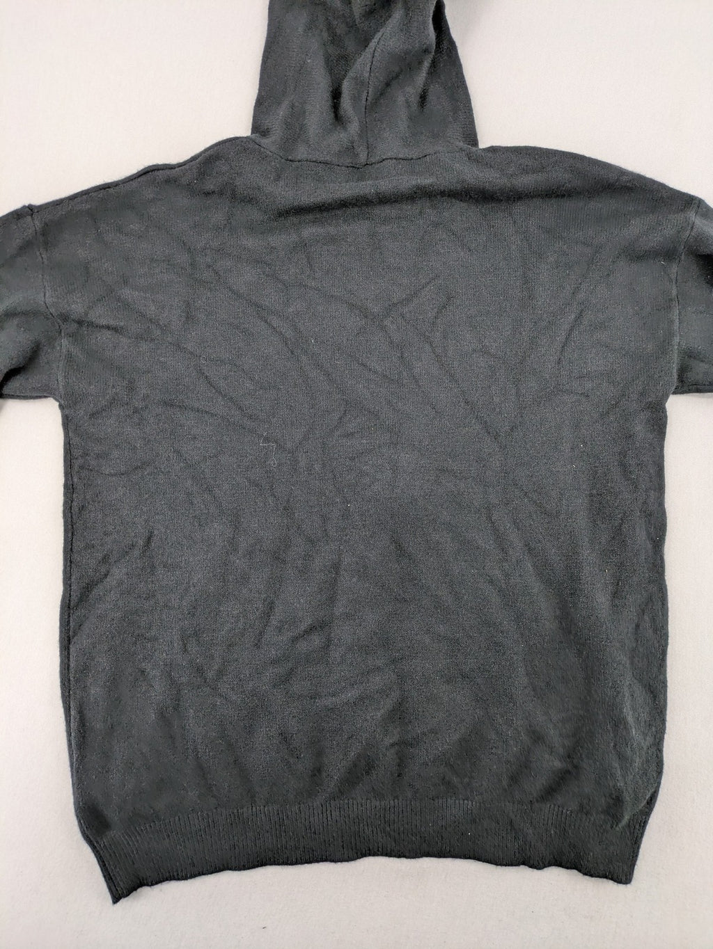 M/L grey hoodie with playful pom-poms and soft viscose blend material.