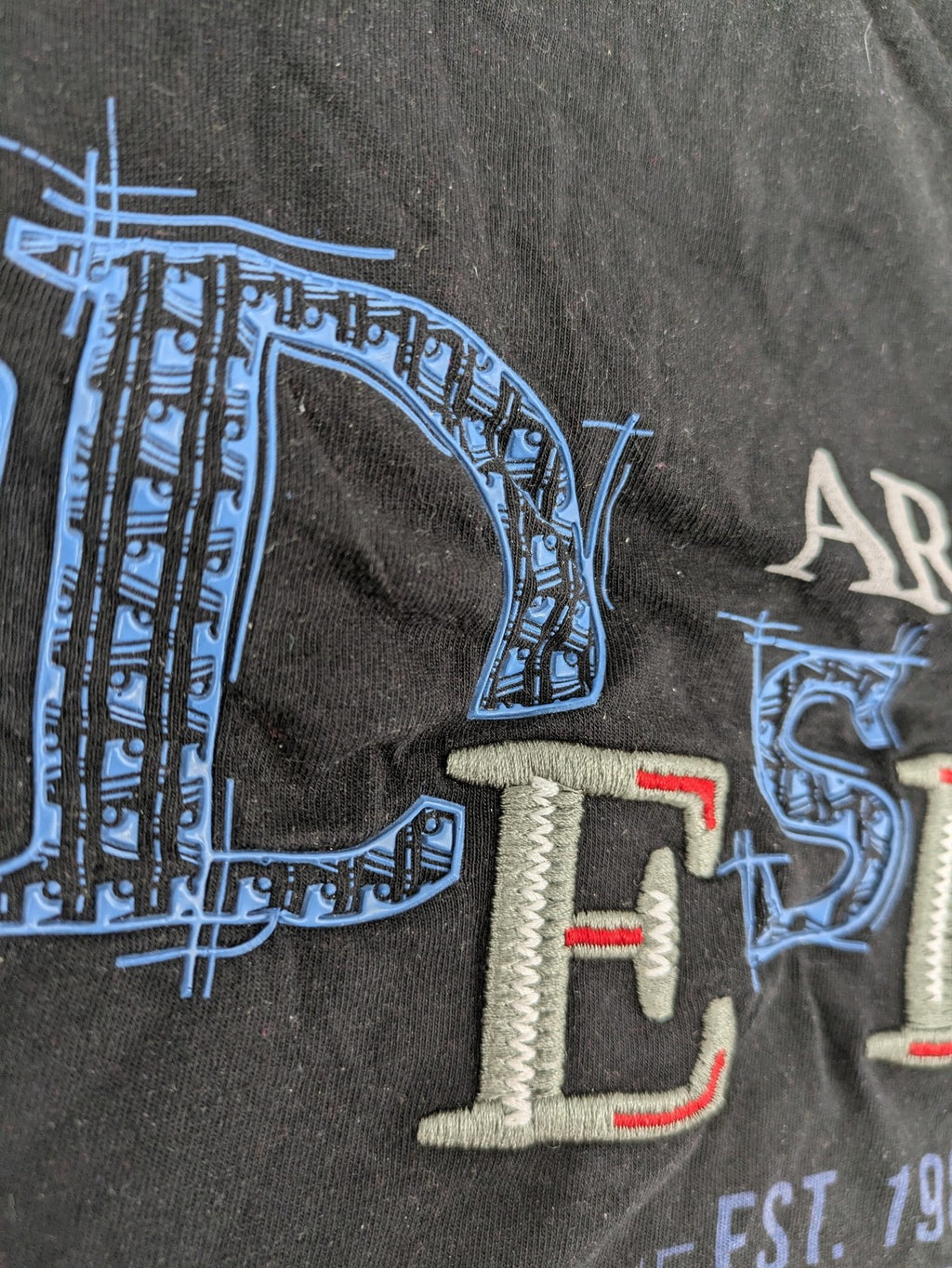 Pedro multi graphic t-shirt size 5XL with embroidered design and contrasting sleeve patterns.