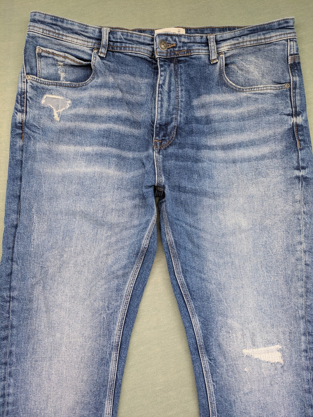 Pull&Bear blue straight jeans with distressed details and classic 5-pocket design.