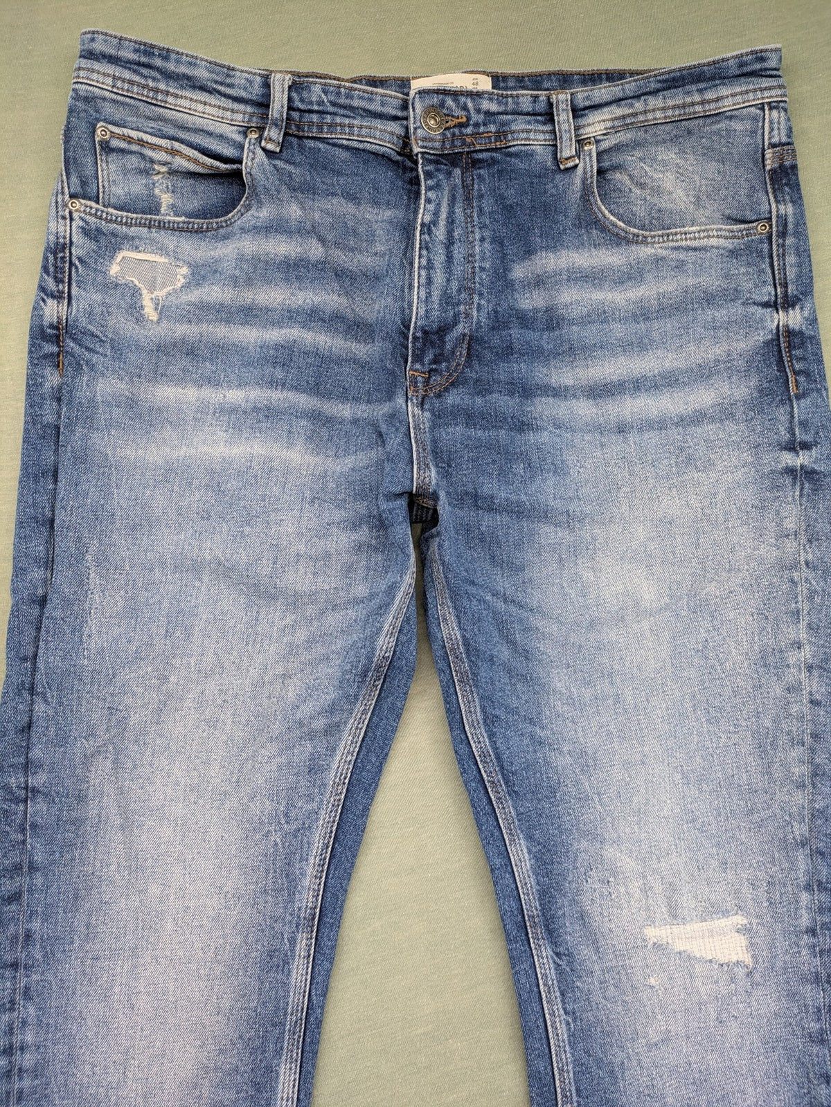 Pull&Bear blue straight jeans with distressed details and classic 5-pocket design.