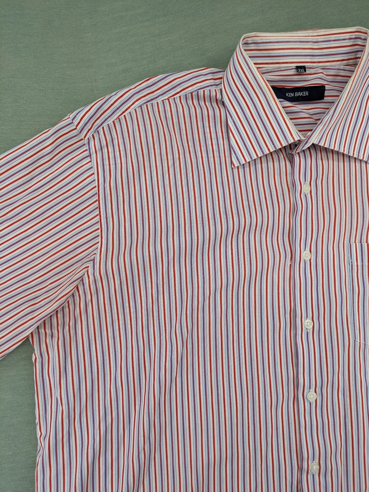 Ken Baker pink short sleeve shirt multicolored striped pattern with chest pocket and classic collar.
