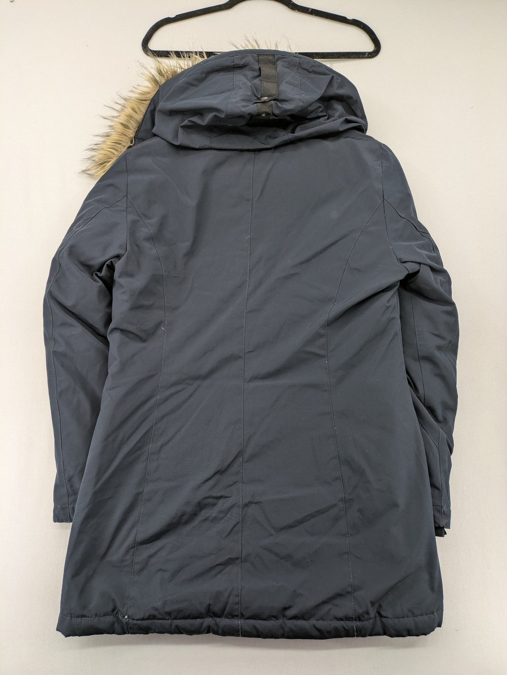 Reset Fifty Seven cream puffer coat with faux fur hood and down insulation.