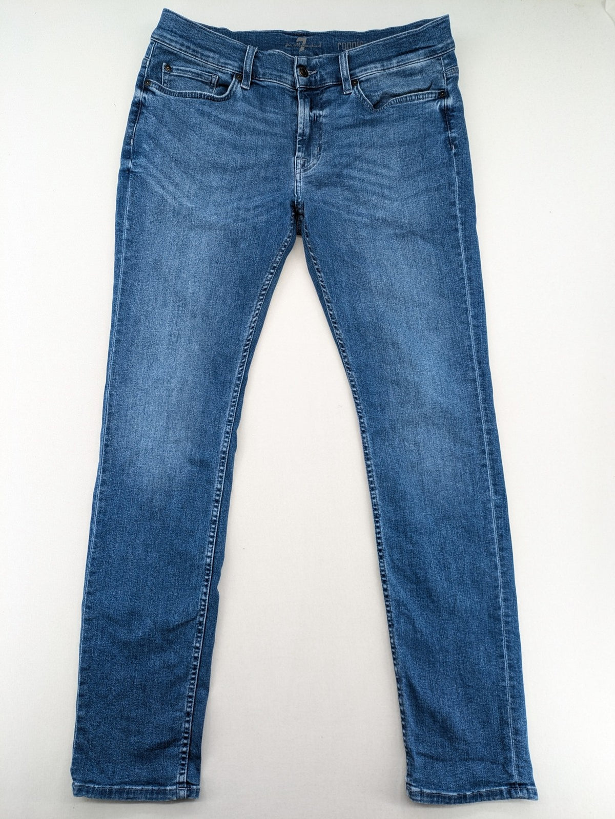 7 For All Mankind blue straight jeans with 5-pocket design and logo on back pocket.