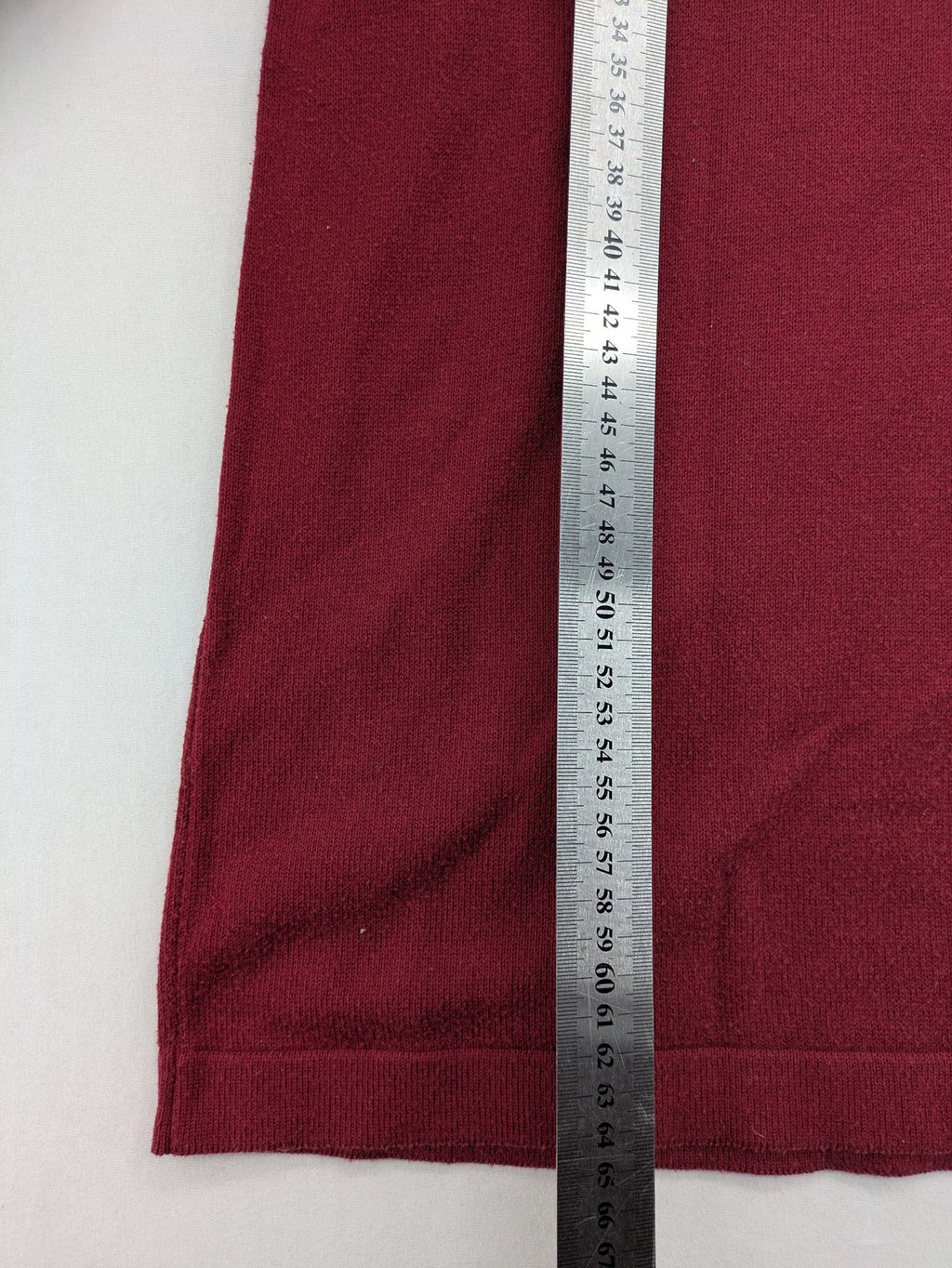 Les Corps burgundy turtle neck jumper with ribbed details and soft cotton blend material.
