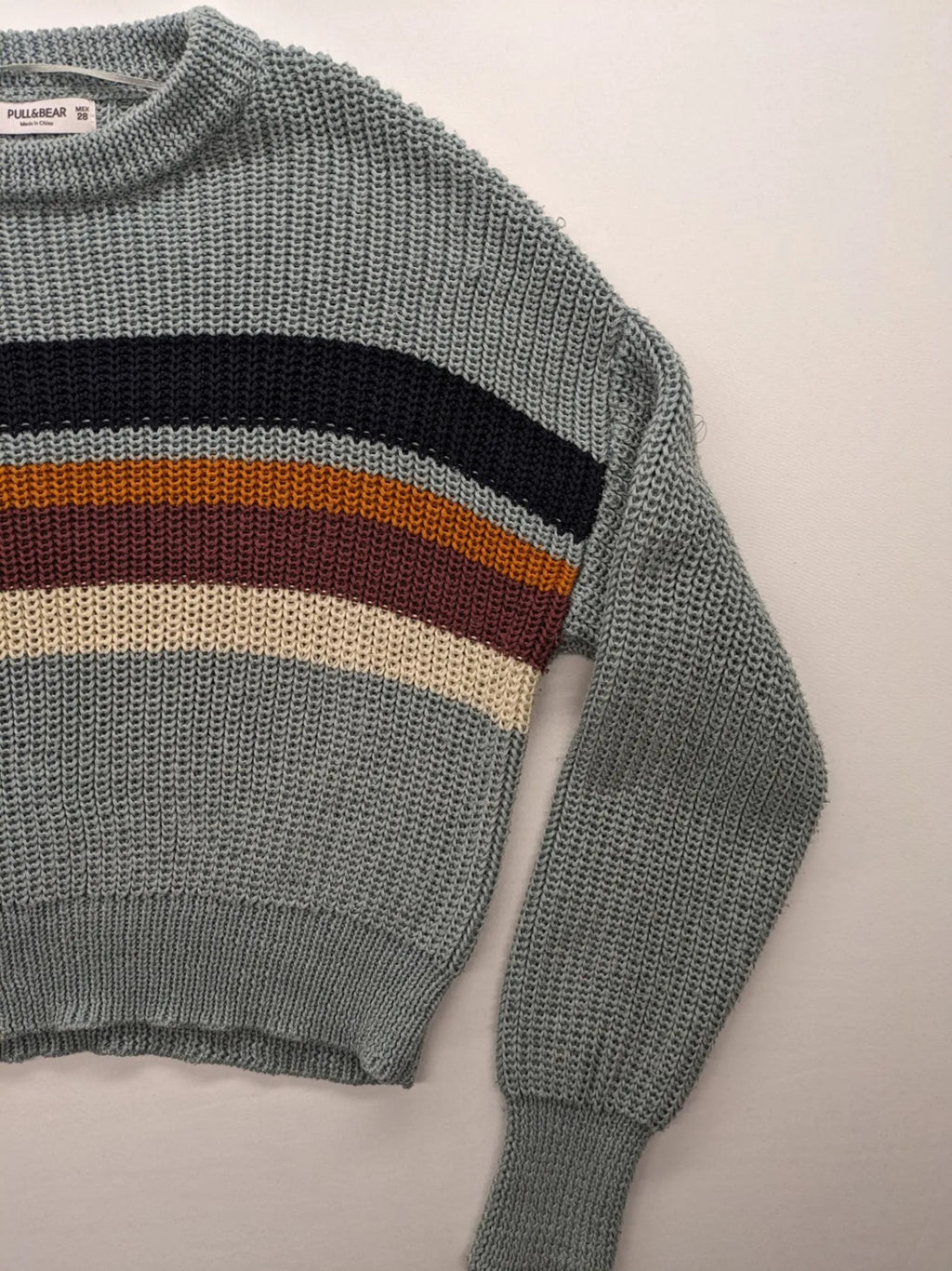 Pull&Bear beige turtle neck jumper with block stripe pattern and ribbed knit texture.
