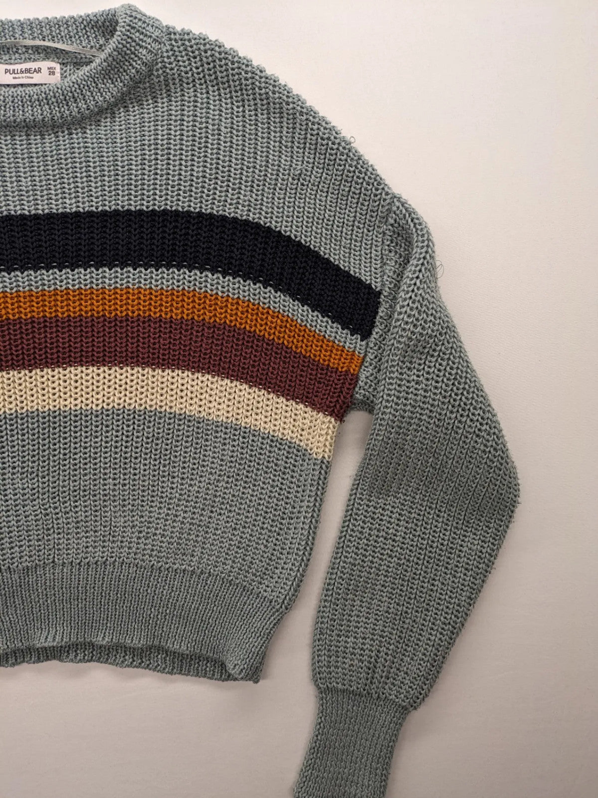 Pull&Bear beige turtle neck jumper with block stripe pattern and ribbed knit texture.