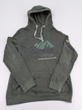Roadsign Australia green hoodie with mountain graphic print and logo patch on sleeve.